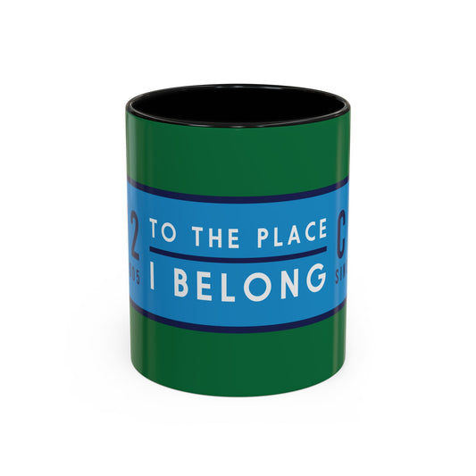 Green and black mug with sky blue badge (CV2-CV6)